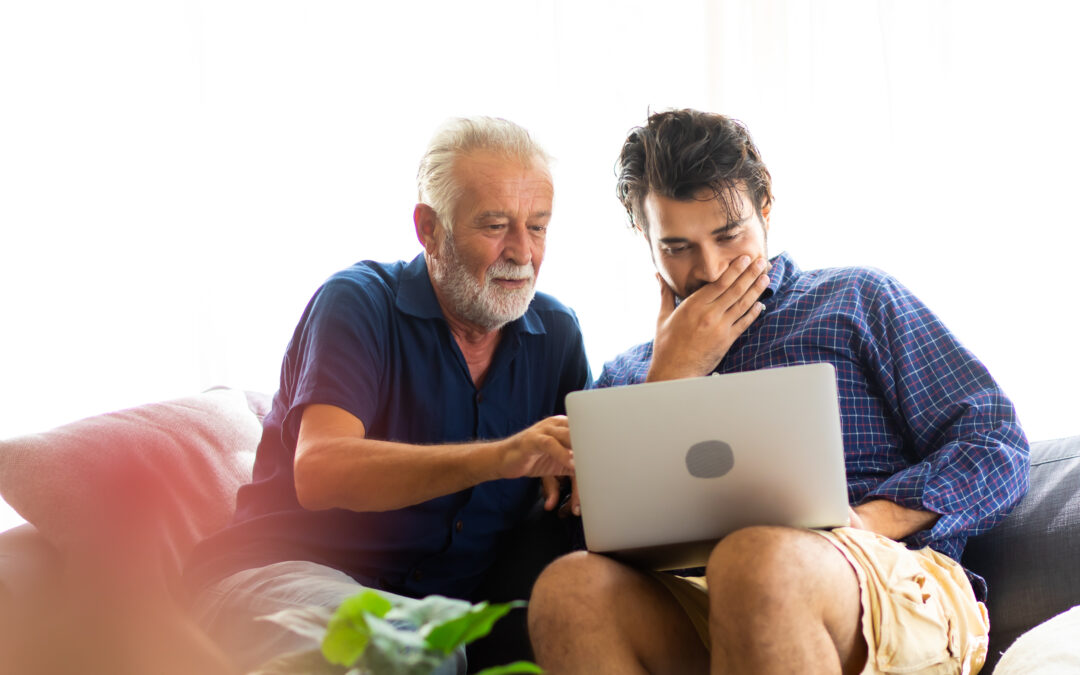 Father and Son working on Financials